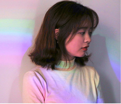 seashell-shaped LED rainbow projector light.